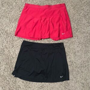 Size medium (fits like a true large) red Nike skirt, L black Nike skirt
